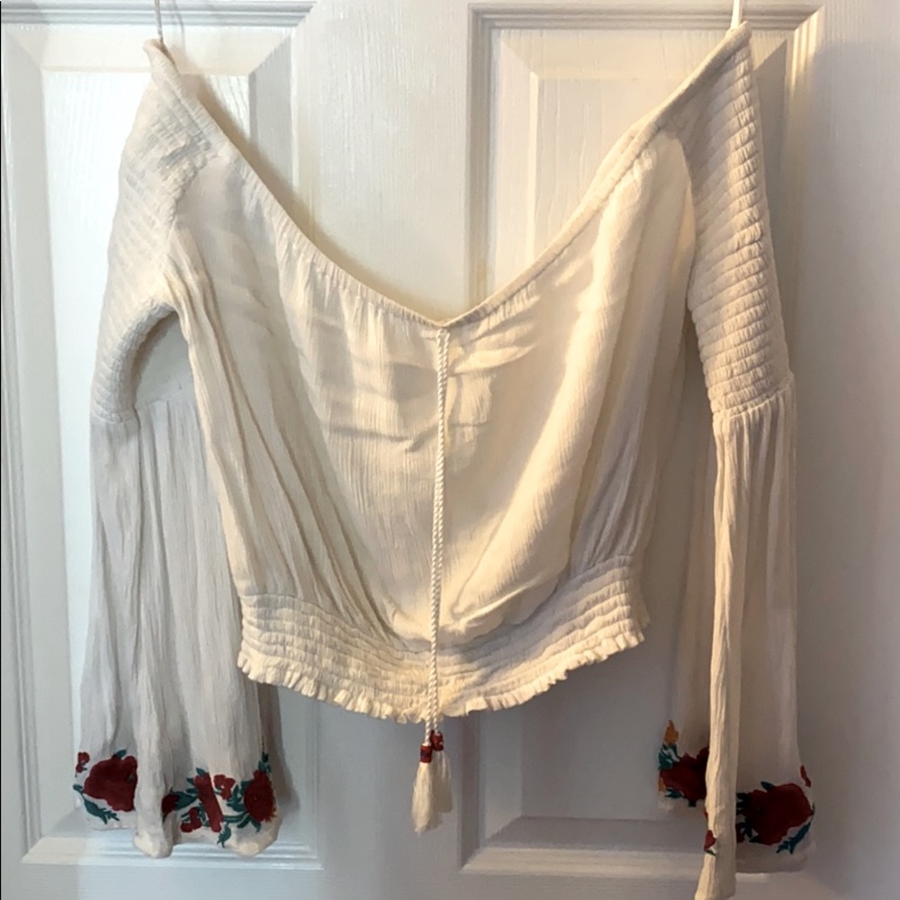 Off the shoulder top with rose detail sleeves